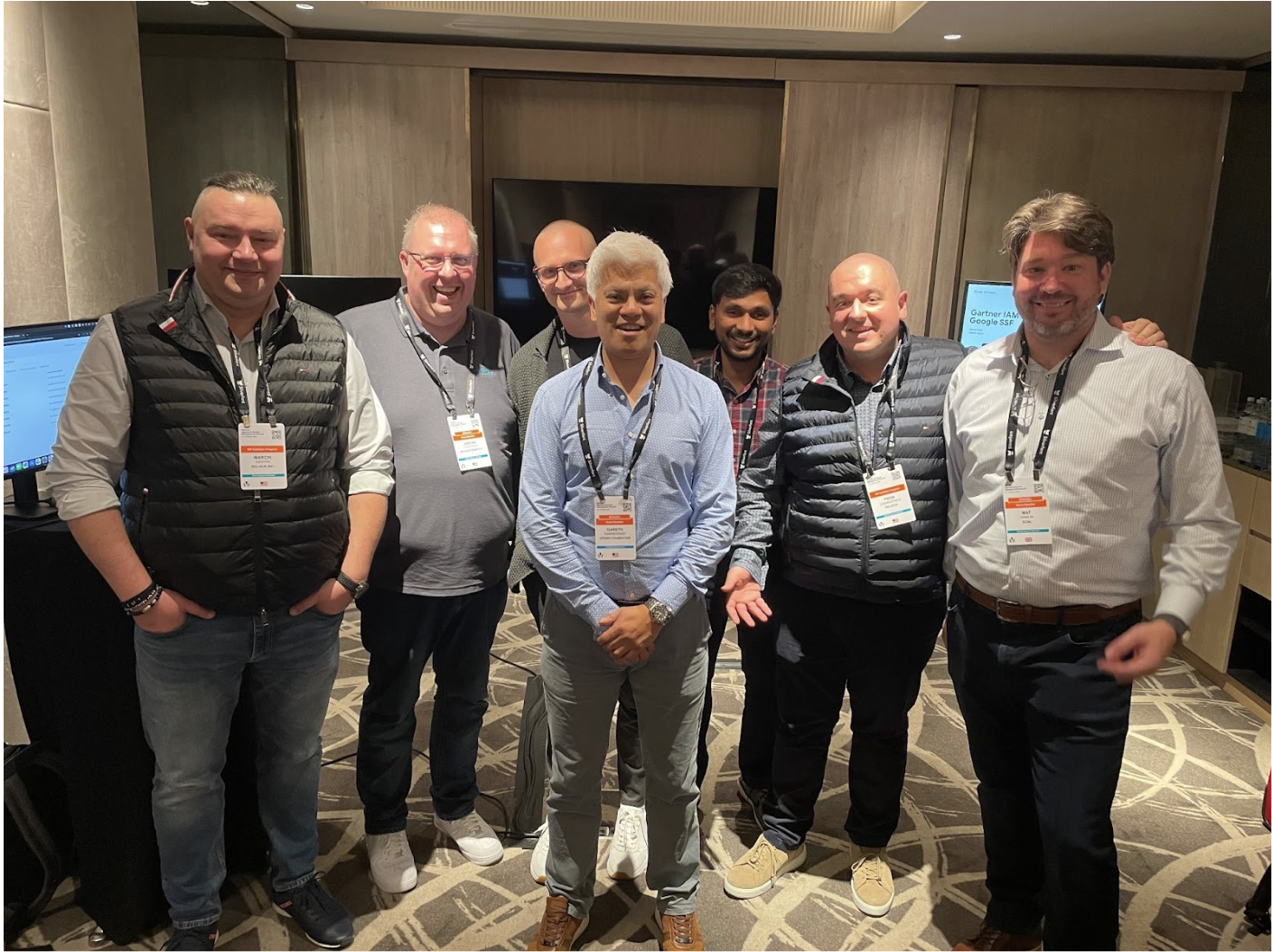 A picture of seven male Gartner IAM Conference attendees